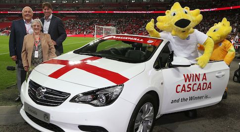 Football legend presents lucky England fan with Vauxhall Cascada